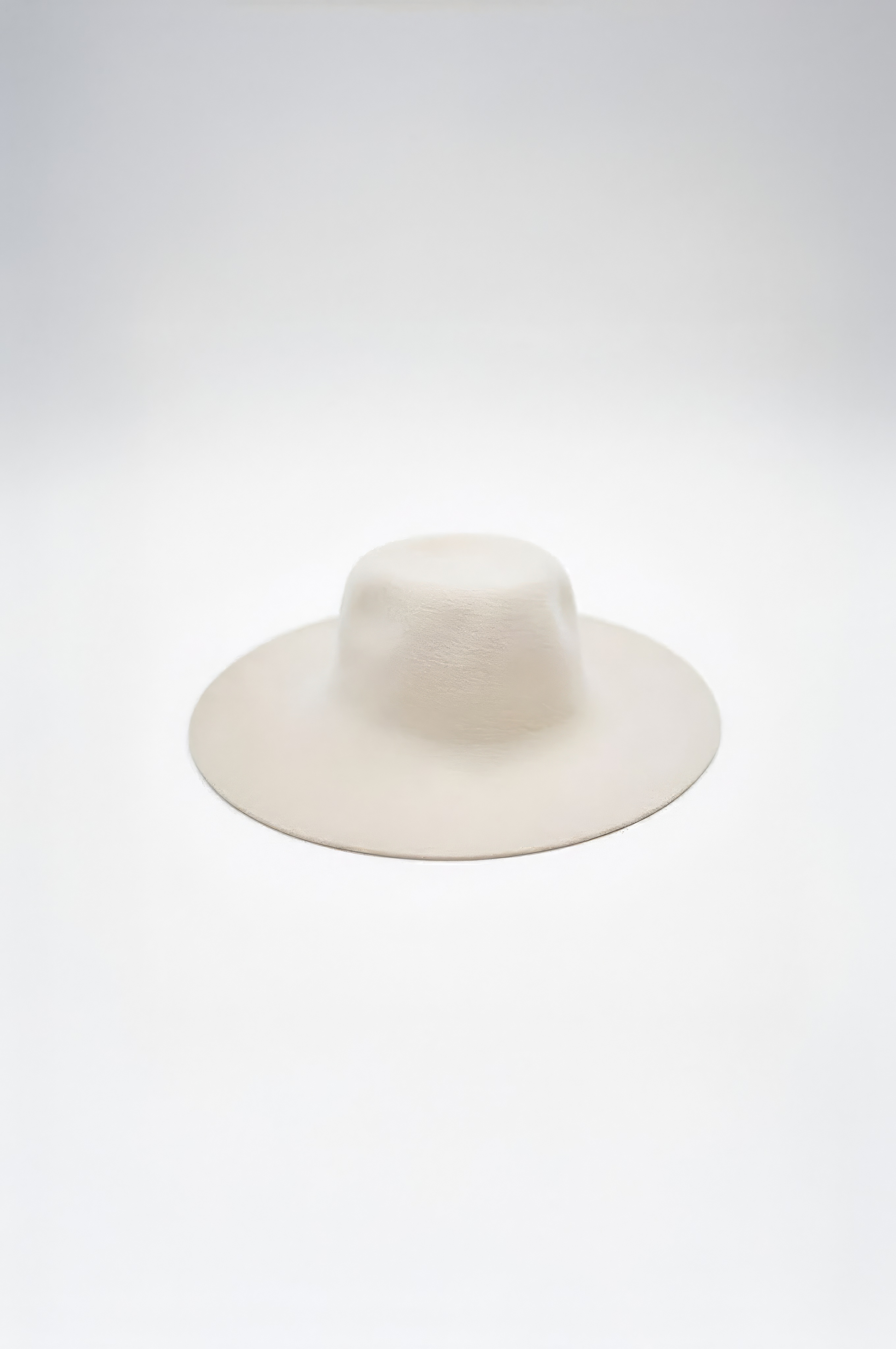 Terra . Warm Ivory . 9”